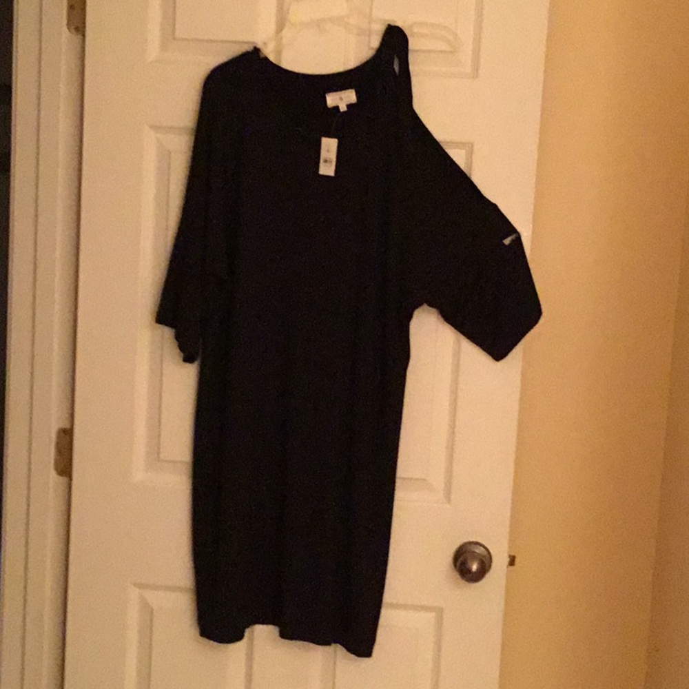 Black Dress, brand new. Size Large, knee length